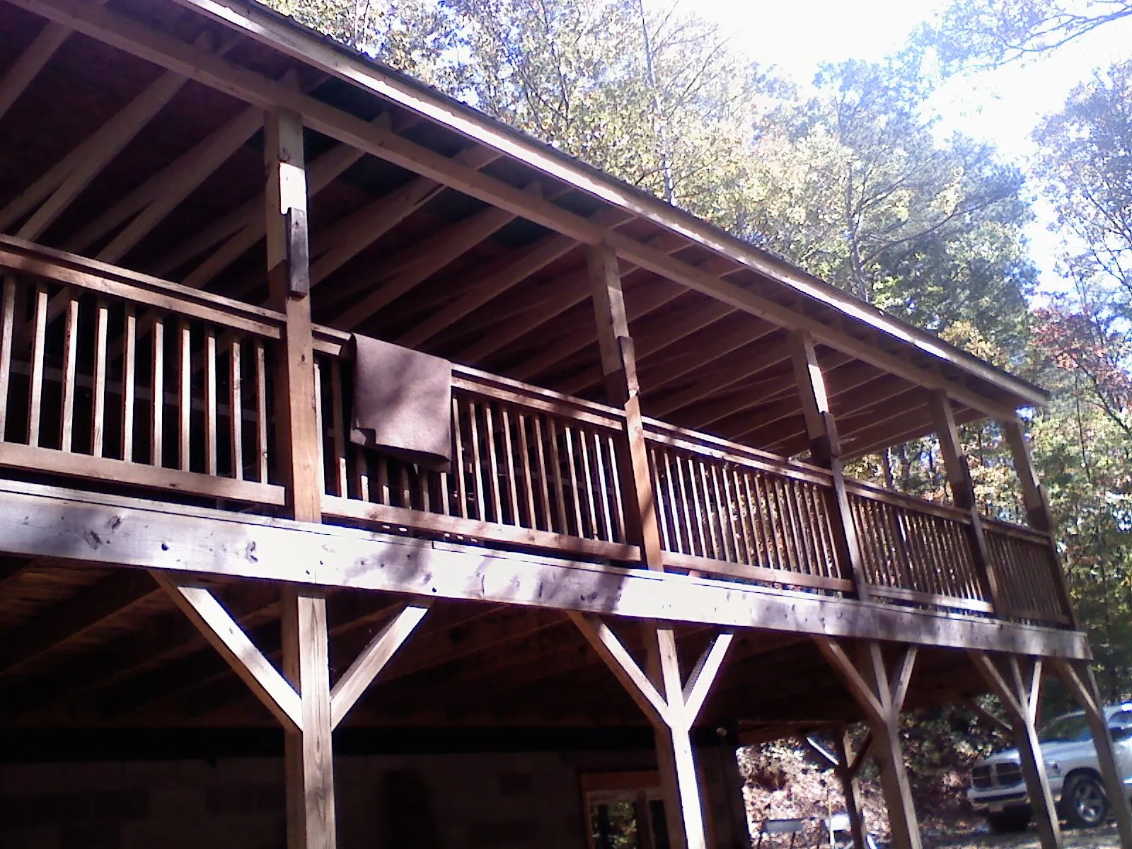 Timber framing under a new elevated porch and deck — Roof Leak Repair in Vian by Roofing Brothers